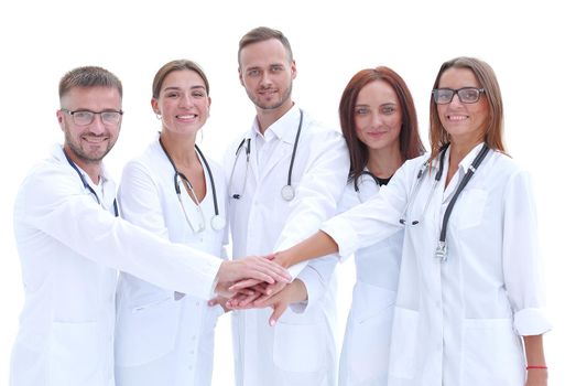 group of young doctors putting their palms together.