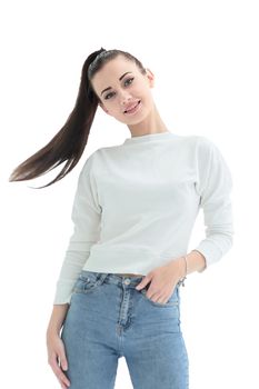 in full growth.a pretty young woman in casual clothes