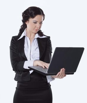 Portrait of a young happy business woman with a laptop over white background
