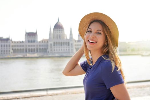Tourism in Europe. Portrait of beautiful smiling tourist woman visiting Budapest, Hungary.