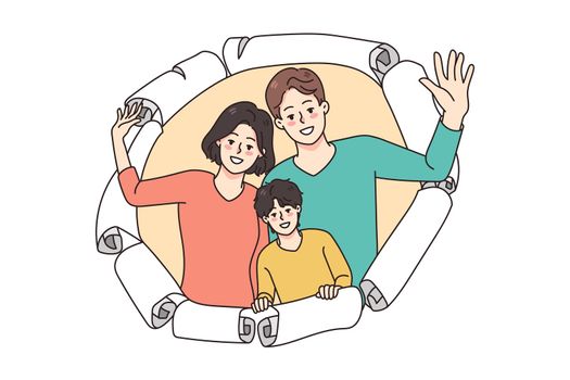 Happy family with child peep through paper hole