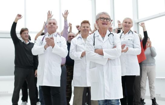 doctors and patients clap their hands. applaud and enjoy success