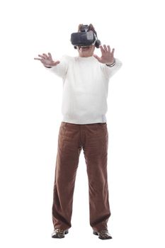 adult male looking with interest through virtual reality glasses