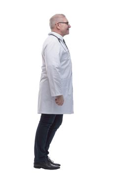 side view. smiling experienced doctor looking at the copy-space