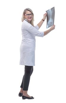 in full growth. female doctor looking at a lung x- ray