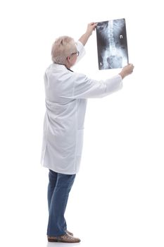 in full growth. female doctor looking at an x- ray of a patient