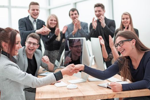 business team applauding at a work meeting