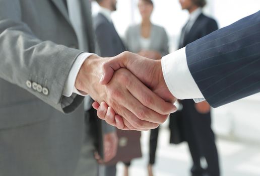 closeup.reliable handshake of business partners