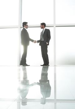 business background. handshake business partners