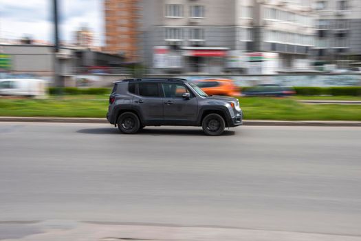 Ukraine, Kyiv - 26 April 2021: Gray Jeep Renegade car moving on the street. Editorial