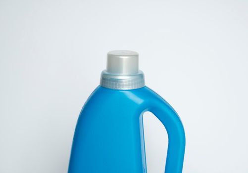 Softener in blue plastic bottle isolated on white background. Bottle with liquid laundry detergent, cleaning agent, bleach or fabric softener. Product design. Mock up.