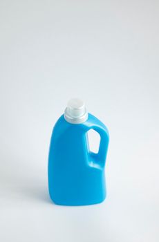 Blue plastic liquid detergent bottle isolated on white background. Laundry container, merchandise template. Product design. Mock up.