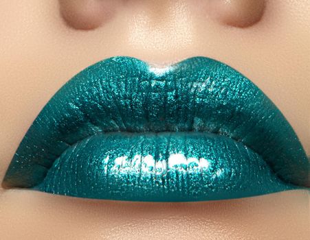Glamour green Gloss Lip Make-up. Fashion Makeup Beauty Shot. Close-up Sexy full Lips with celebrate Aquamarine Lipgloss