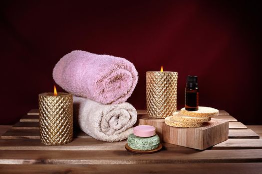 Beautiful Spa. Aroma Therapy with Herbal Oil, Natural Soap and Relaxation Candles. Wooden Color and Warming Towels