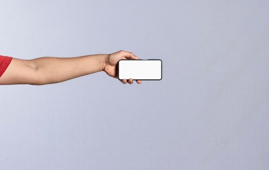 Hand with cell phone isolated, hand showing cell phone isolated, one hand showing cell phone screen isolated