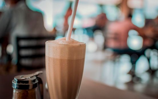 Close up of cappuccino milkshake, close up of cappuccino milkshake with unfocused background