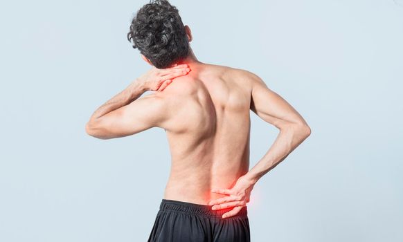 Neck and back pain concept, man with neck and back muscle pain, Close up of man with neck and back pain, a man with muscle pain on isolated background.