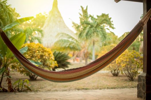 Beach hammock with copy space, hammock in a beach hut, Concept of TRANQUILITY IN VACATION