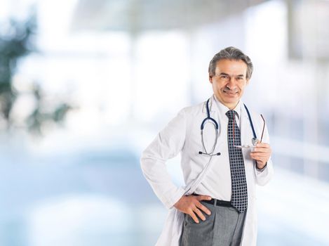 Adult qualified physician diagnostician, with a stethoscope, meditating on diagnozom.