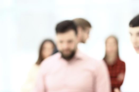 background image of a business team in blur