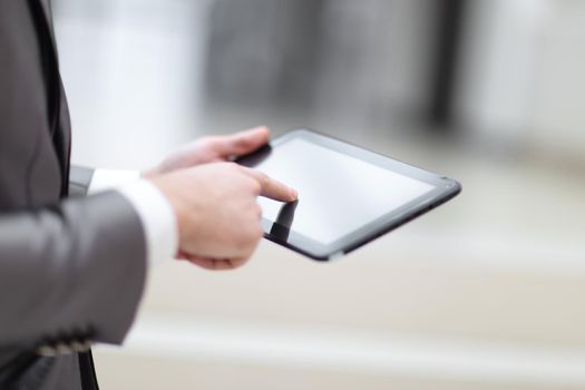 Close-up Of Businessperson Using Digital Tablet With Blank Disp