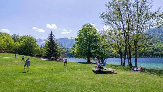 Bohinj, Slovenia - April 29, 2018: Lake Bohinj in Slovenia. Colorful summer on the Bohinj lake in Triglav national park Slovenia, Alps, Europe. Mountain Lake bohinj in Julian Alps, Slovenia