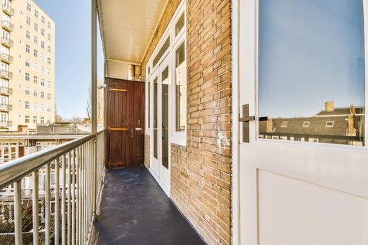 Panoramic view of brick buildings from balcony