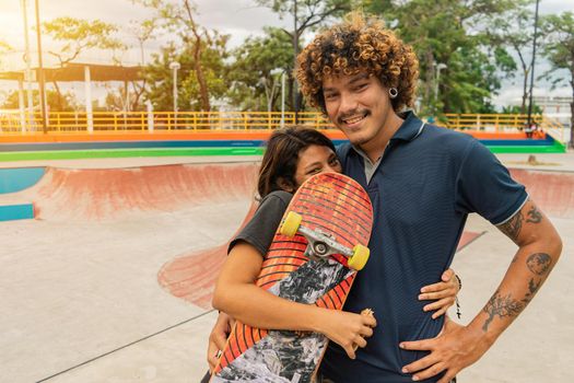 Skater couple in a park enjoying their urban lifestyle in Nicaragua