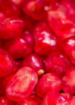 Full frame background of Pomegranate seeds as fruit background
