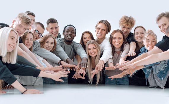 multinational group of young people joining their palms