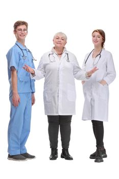 Portrait of a female doctor with two of her co-workers against white background