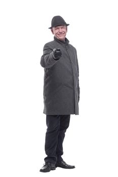 intelligent man in a hat and autumn coat. isolated on a white background.