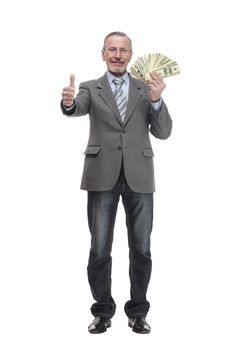 Smiling senior gentleman holding money, isolated on white background