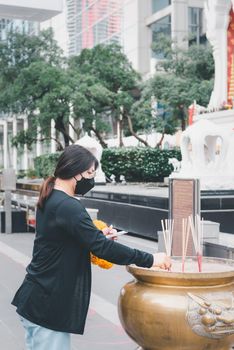 Thai buddhism pray for benefaction worship