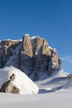 Sella Towers in the Dolomites covered in Snow. South Tirol in Winter. View from Passo Sella just above Val Gardena
