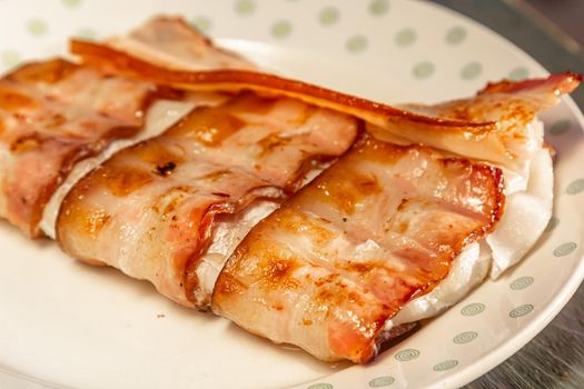 Cod fish wrapped in bacon