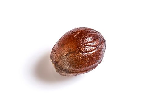Nutmeg spice on a white background
