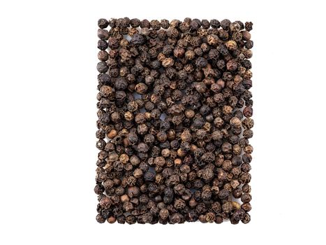 Black peppercorns isolated on white background with copy space for text or images. Spices and herbs. Packaging concept. Close-up.