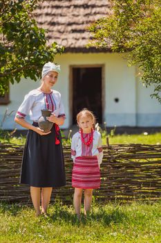 mother and daughter in Ukrainian national costumes