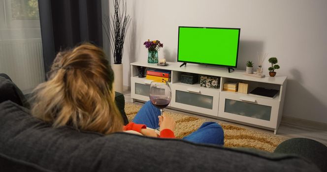 Woman Watching TV Green Screen and Chroma Key.