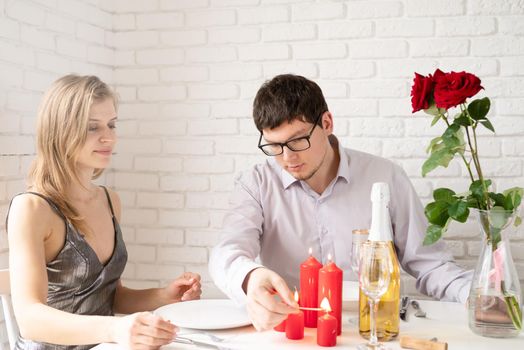 romantic date. Couple in love having romantic date at home spending time together
