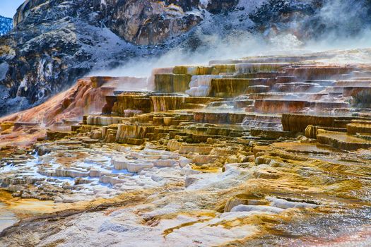 Stunning terrace hot spring in Yellowstone winter