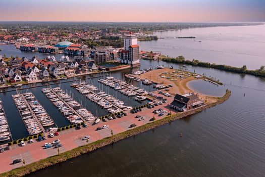 Aerial from the harbor and city Harderwijk in the Netherlands at sunset