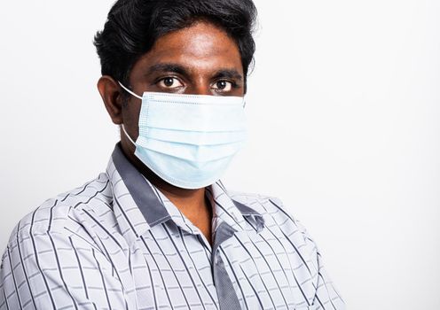 black man wearing surgical hygienic protective cloth face mask against coronavirus