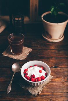 Bowl of Summer Dessert with Raspberry and Cream