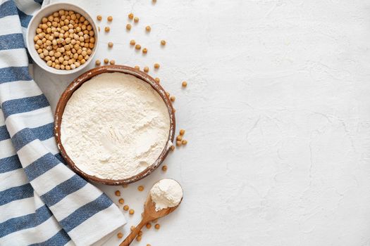Chickpea and flour in ceramic bowl on white background