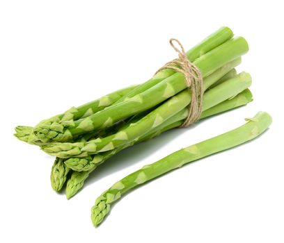 bunch of fresh raw asparagus on white isolated background
