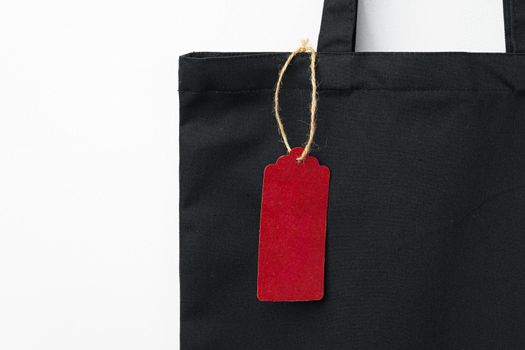 Eco bag for shopping with blank tag on white background