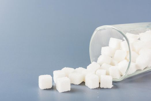 sugar cube sweet food ingredient spilled out of the glass