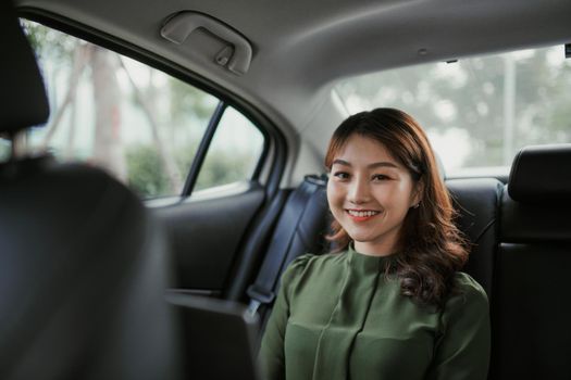Woman sitting on car seat